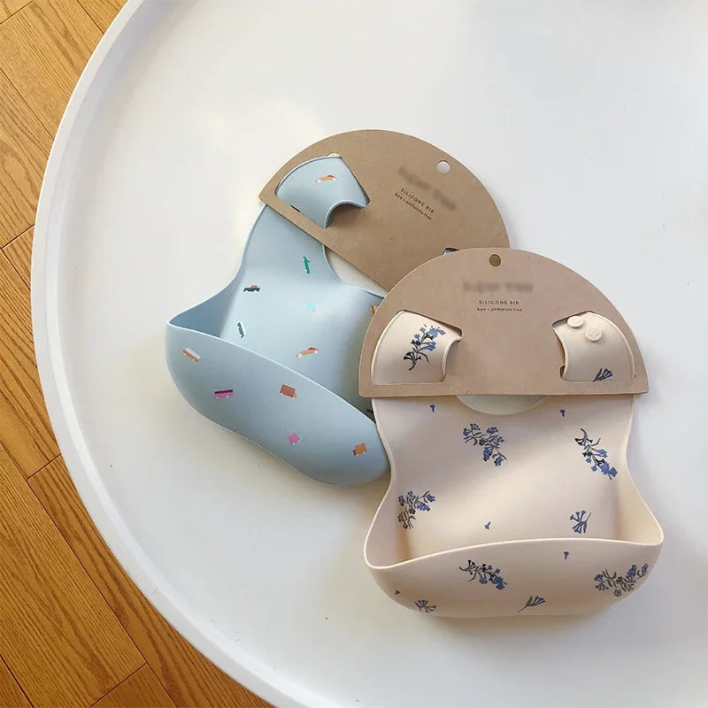 silicone baby bib with a spill pocket