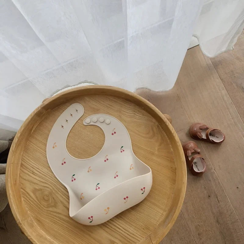 silicone baby bib with a spill pocket